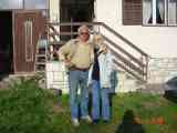 Lilly and her Dad in front of his house